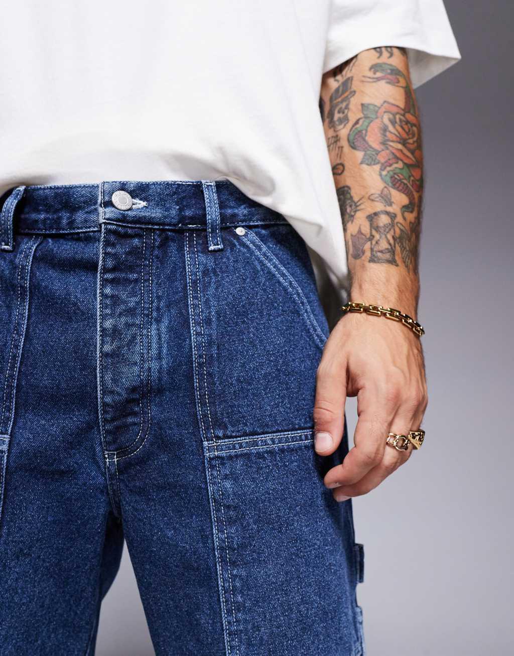 ASOS DESIGN baggy carpenter jeans in dark wash blue Product Image