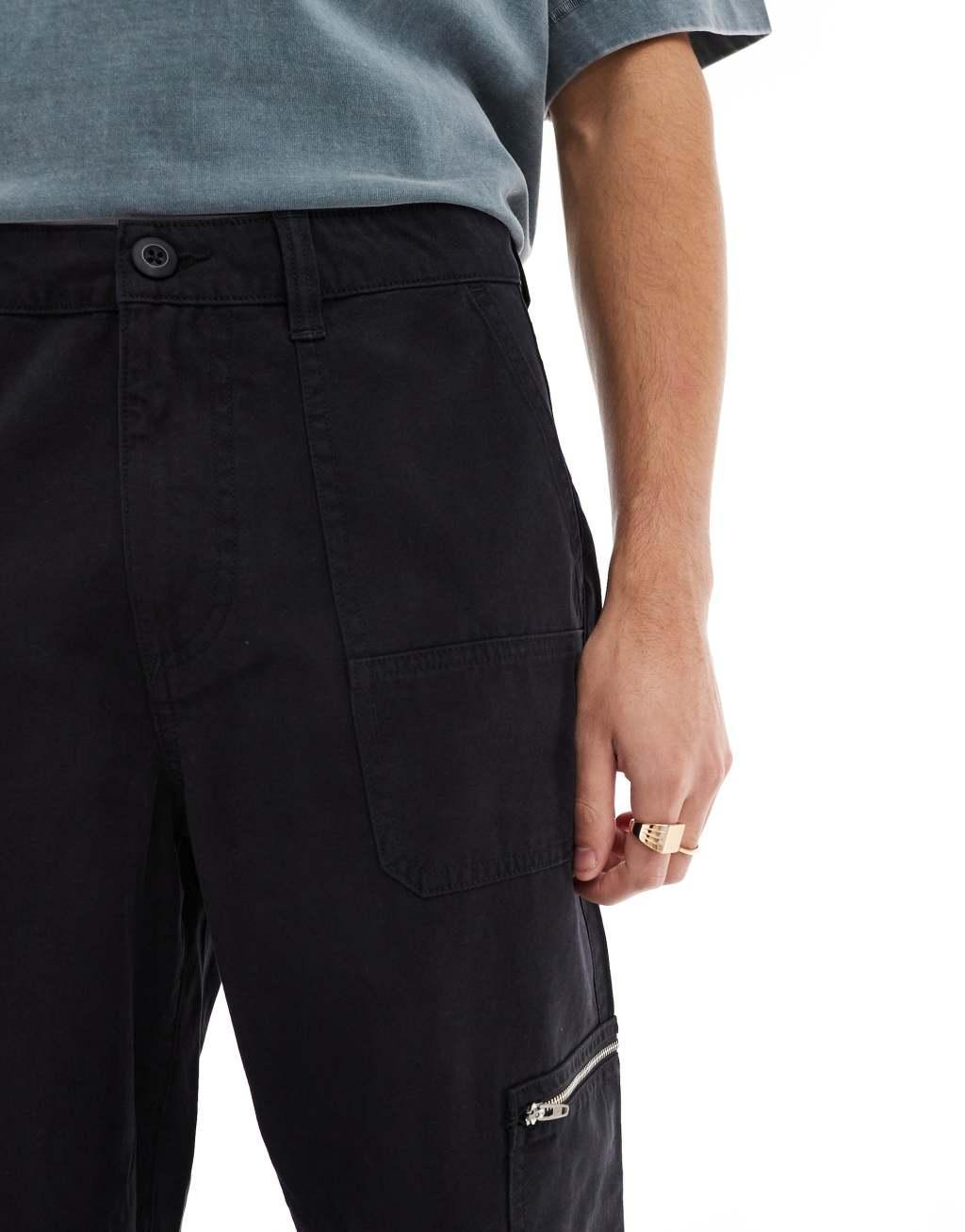 ASOS DESIGN baggy carpenter pants with zip details in washed black Product Image