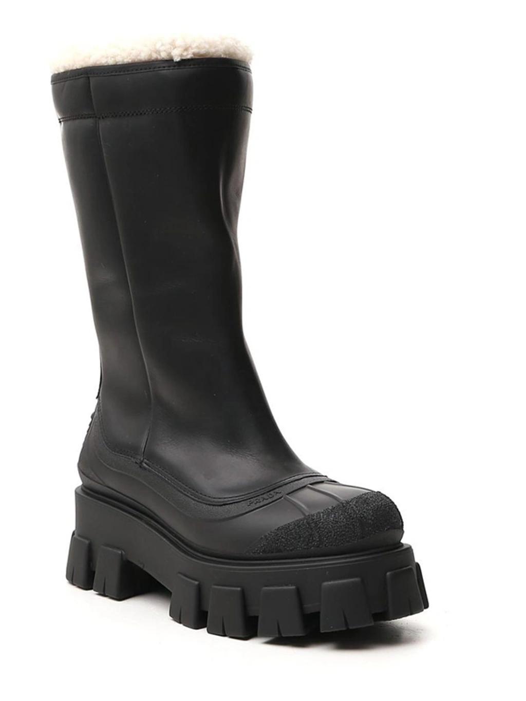 Monolith Shearling-lined Leather Boots In Black Product Image