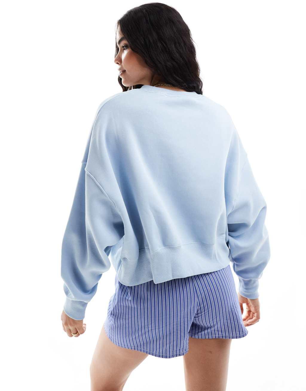 Nike Phoenix Fleece oversized cropped sweatshirt in light blue Product Image