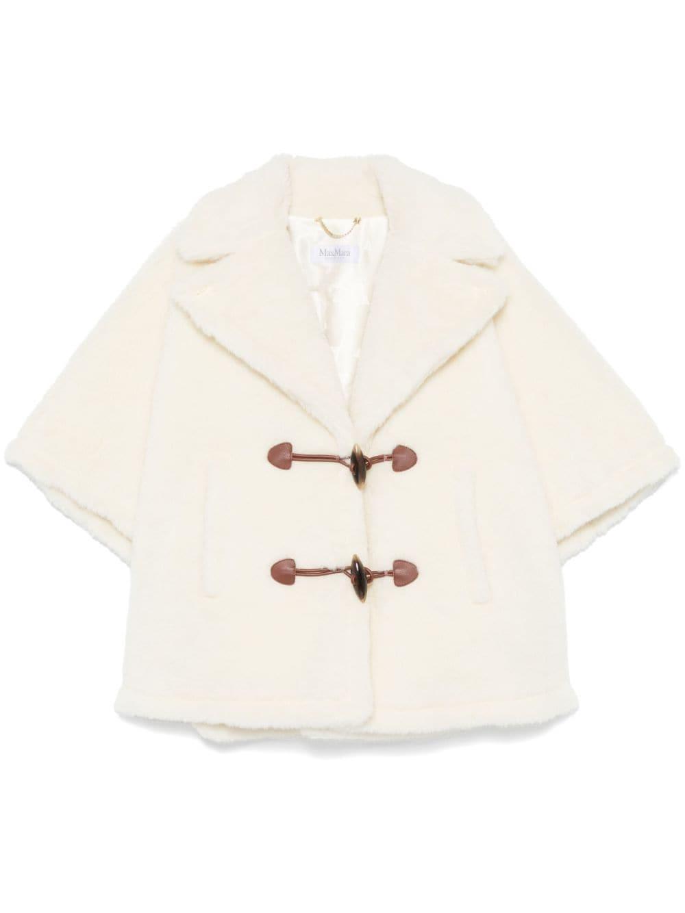 Capes In White Product Image