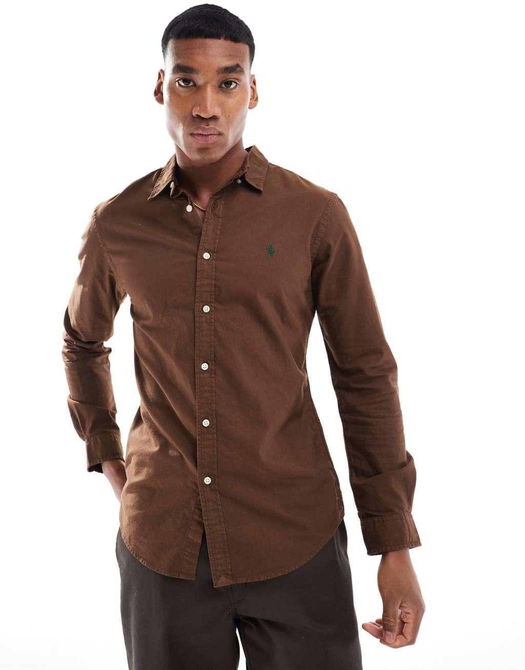 Polo Ralph Lauren icon logo slim fit garment dyed oxford shirt in brown Product Image