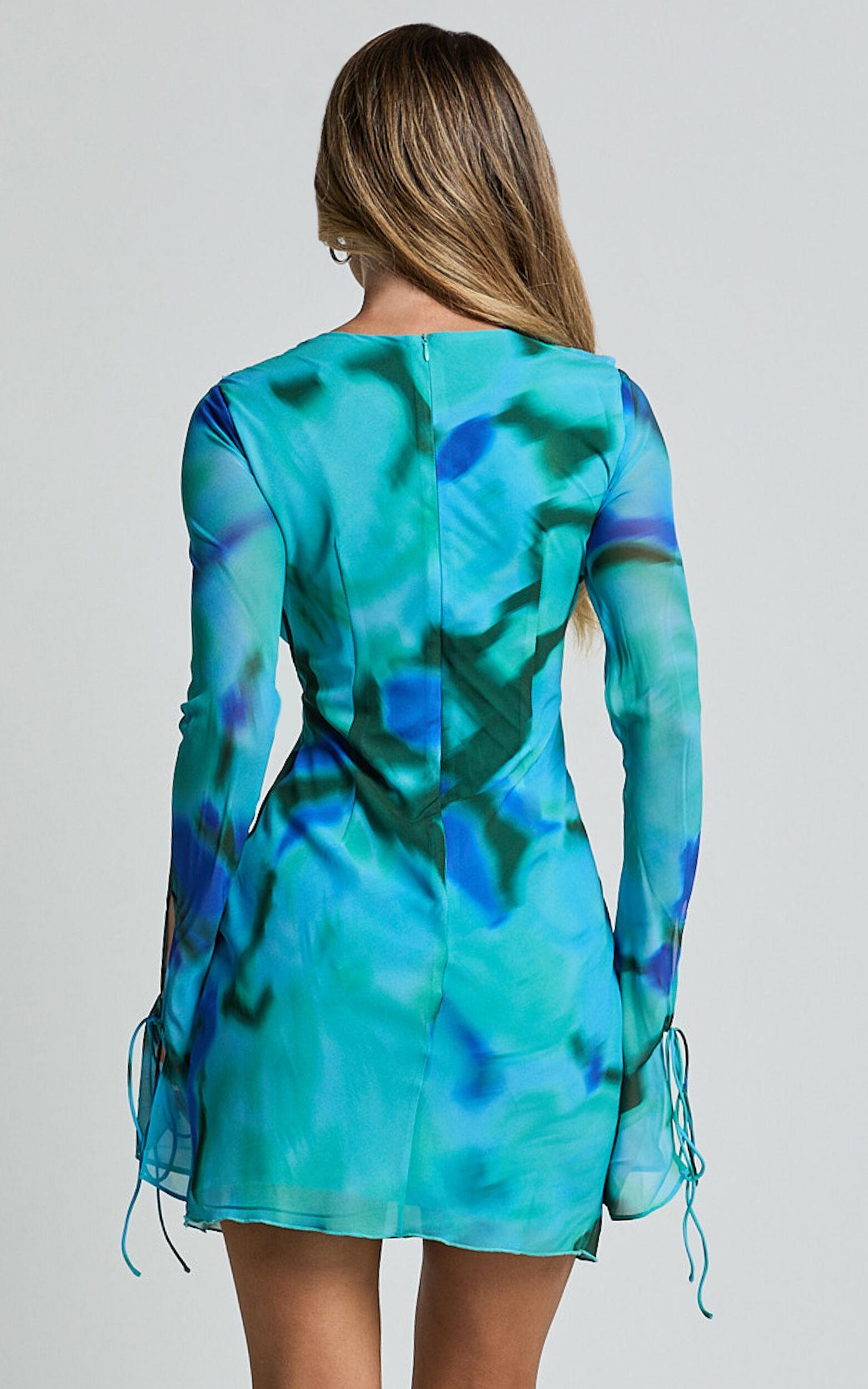 Alesya Mini Dress - Ruffle Plunge Neck Long Sleeve Tie Detail Dress in Blue Floral Print Product Image