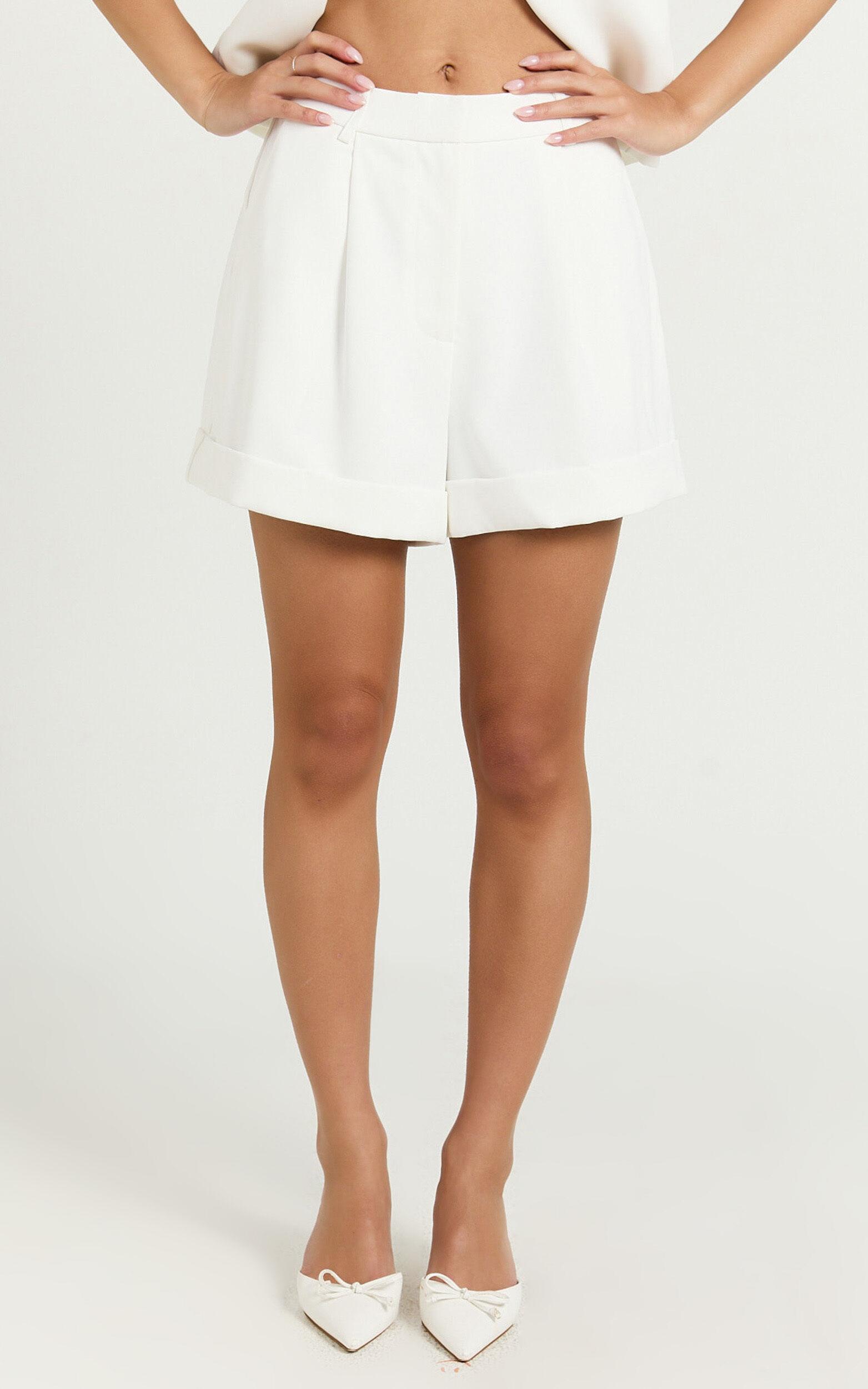 Diane Shorts - High Waisted Cuffed Single Pleated Tailored Shorts in White Product Image