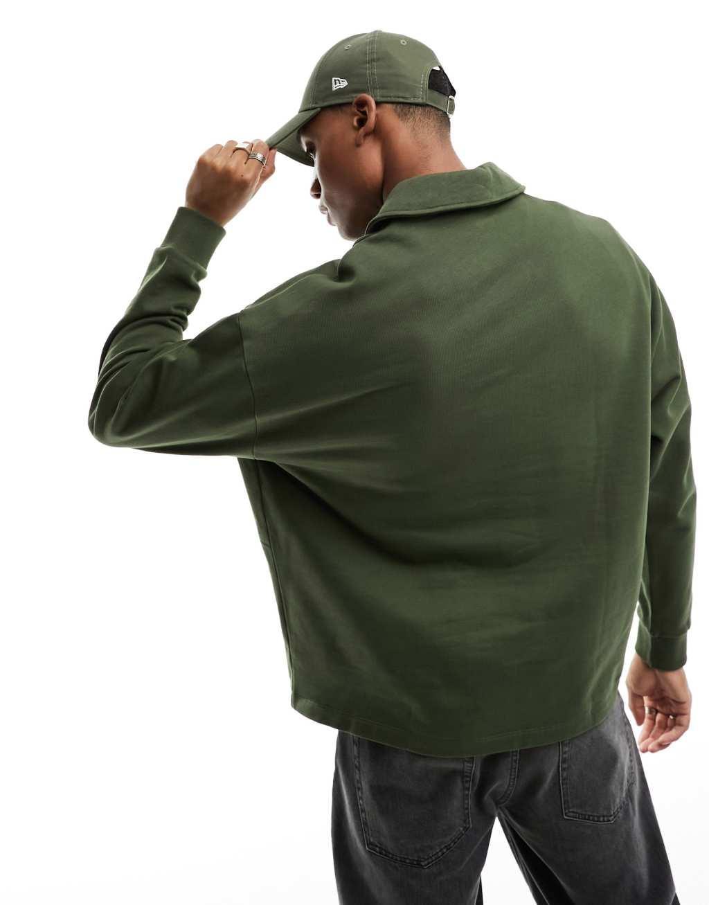 ASOS DESIGN oversized half zip sweatshirt with pockets in dark green Product Image