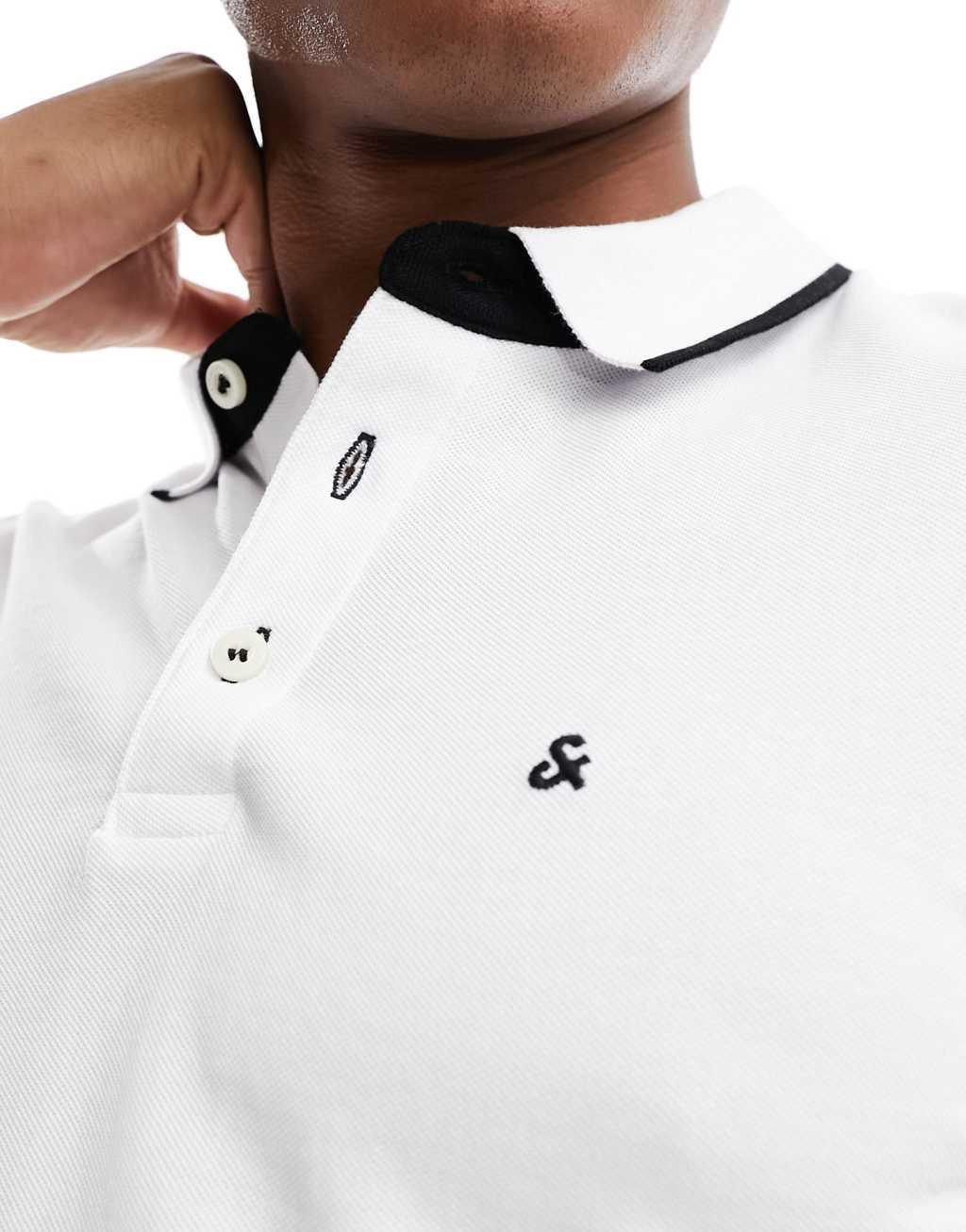 Jack & Jones Essentials slim fit tipped pique logo polo in white Product Image