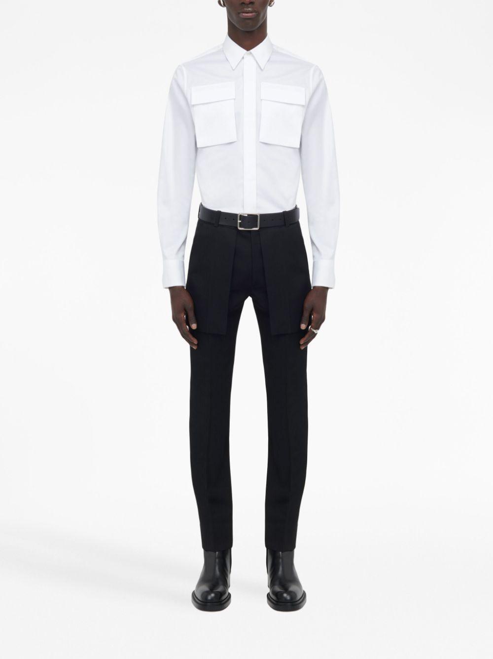 Exposed Pocket Trousers In Black Product Image