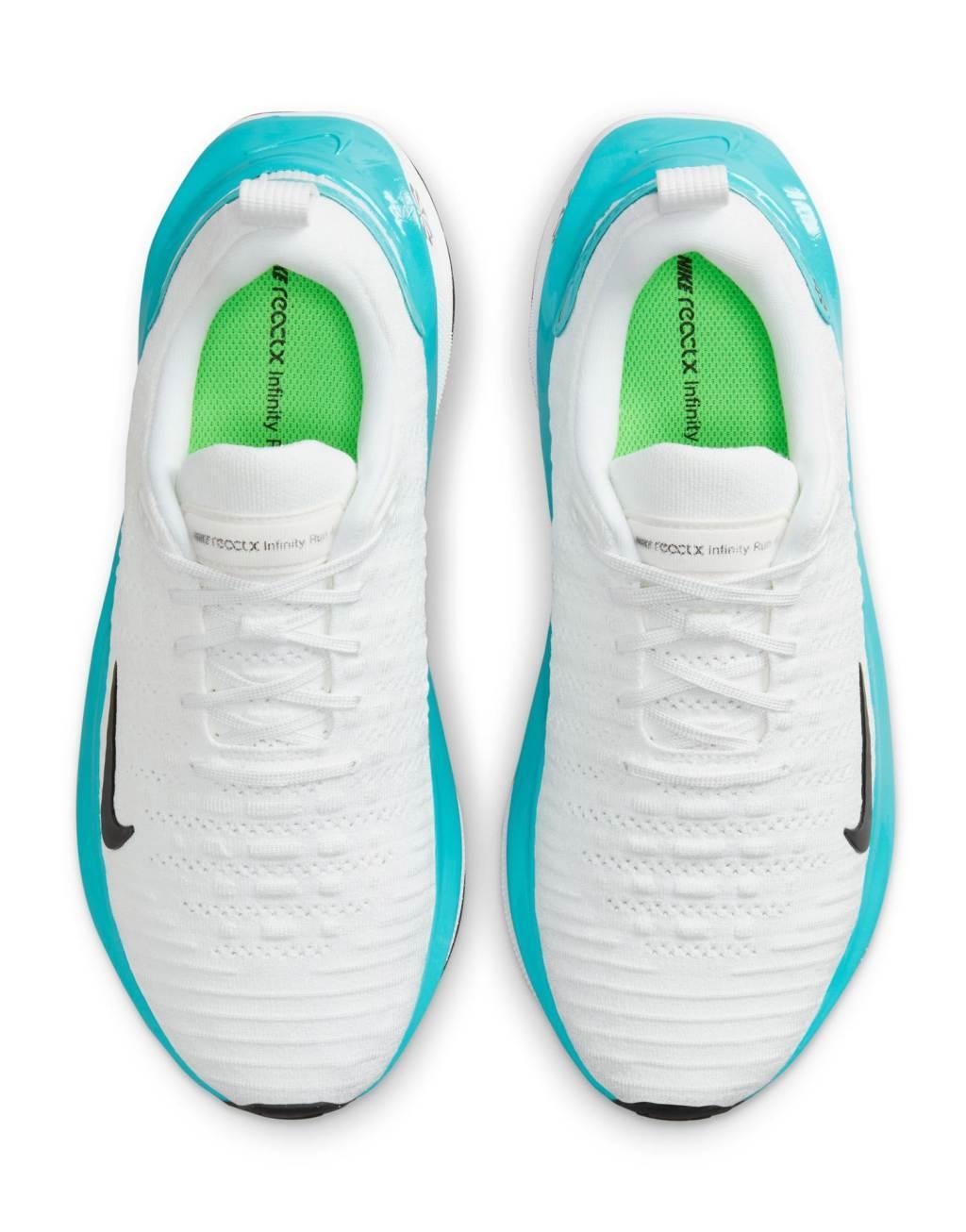 Nike Running Infinity Run 4 sneakers in white and blue Product Image