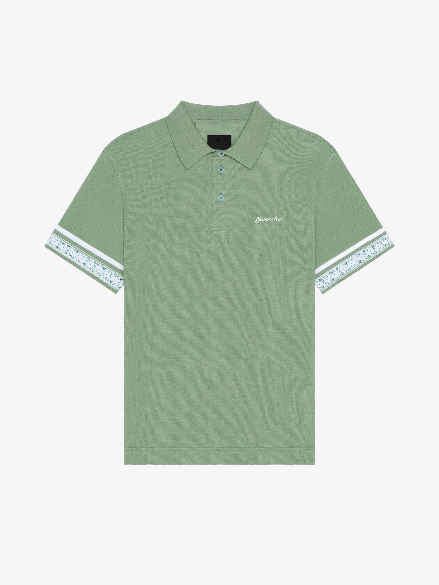 Polo in cotton with floral detail Product Image