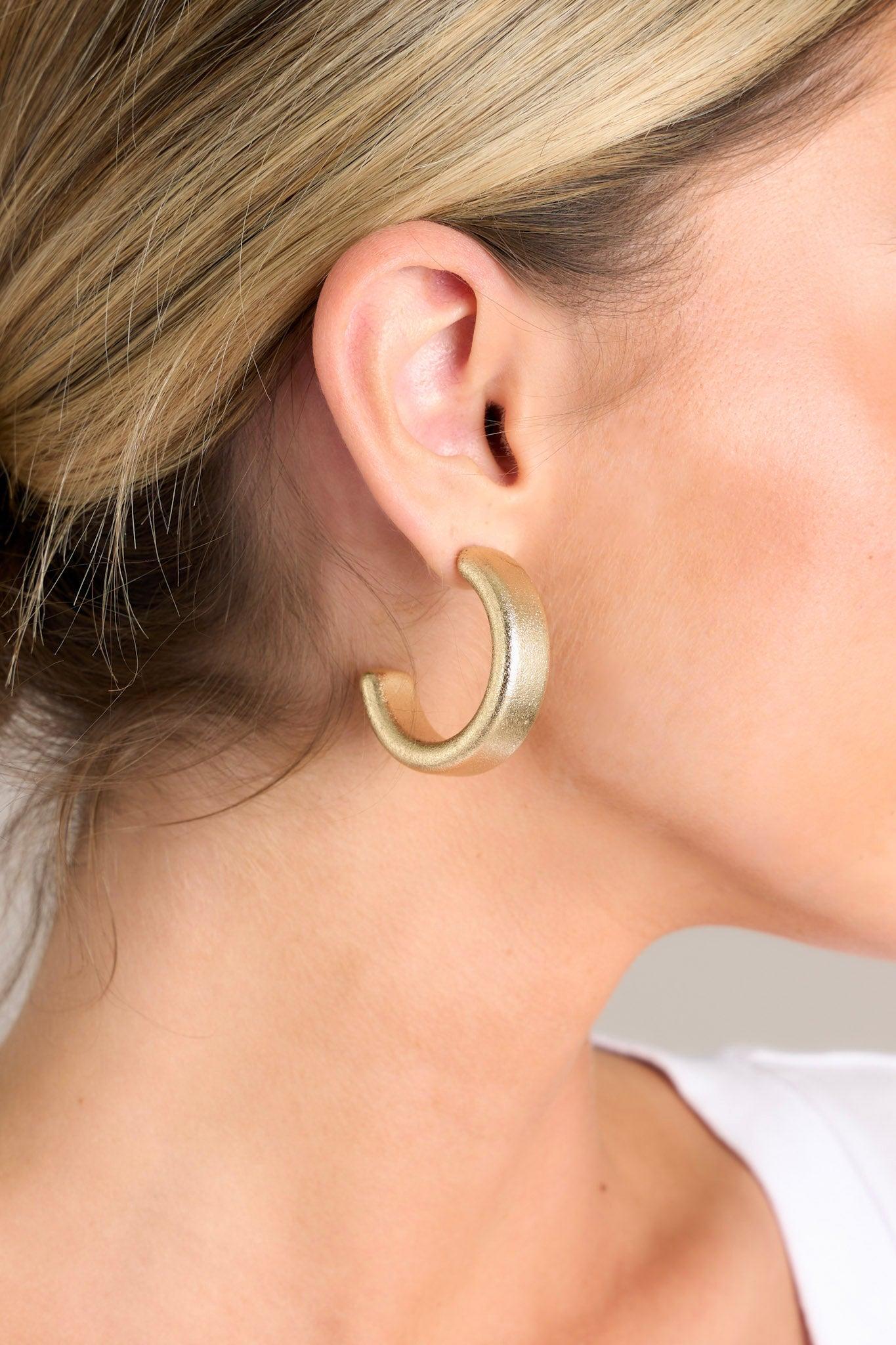 Gleaming Orbit Thick Gold Textured Hoop Earrings Product Image