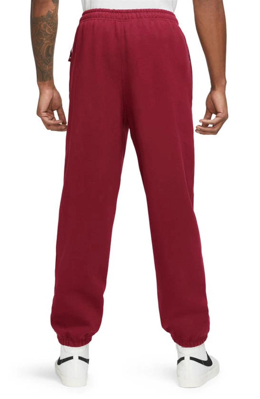 Men's Solo Swoosh Fleece Pants In Red Product Image