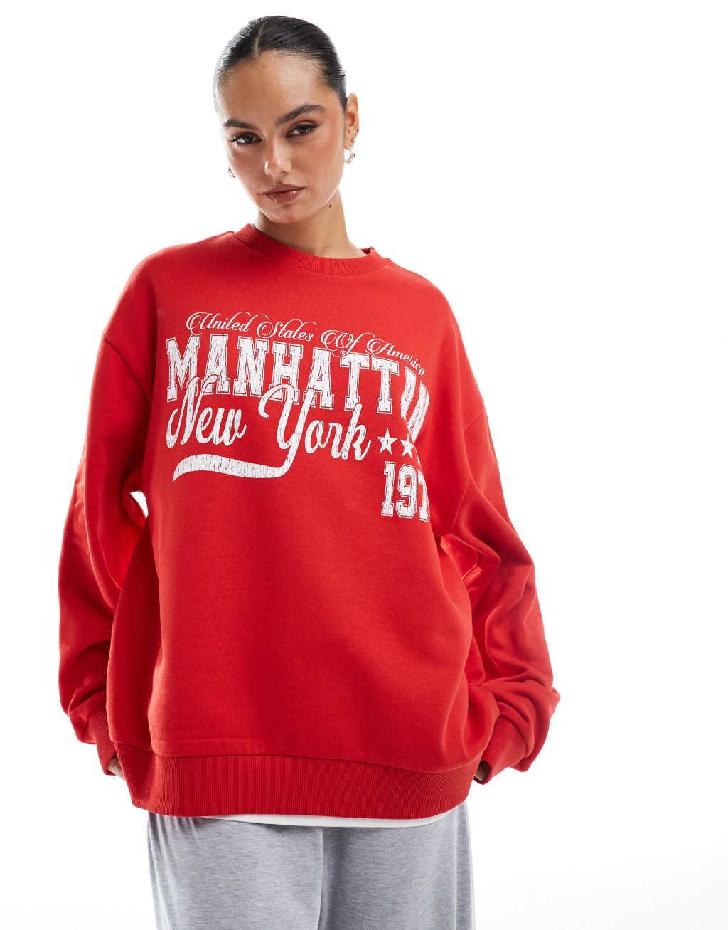 ASOS DESIGN oversized sweatshirt with Manhattan graphic in red Product Image