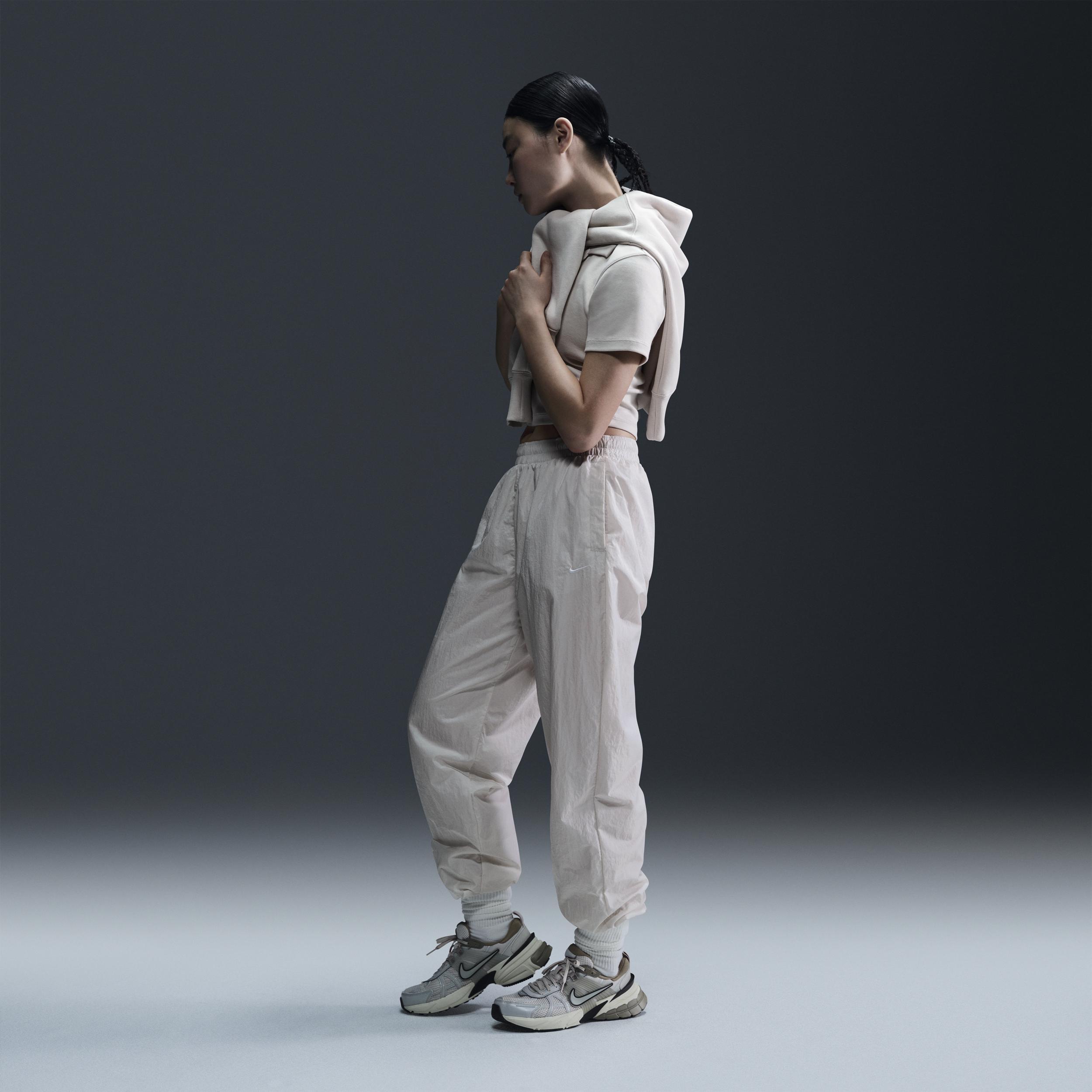 Womens Nike Sportswear Essential Mid-Rise Oversized Woven Jogger Pants Product Image