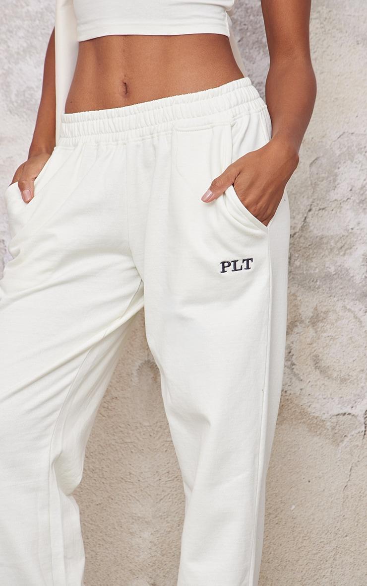 PRETTYLITTLETHING Cream Contrast Embroidery Wide Leg Low Rise Sweatpants product image