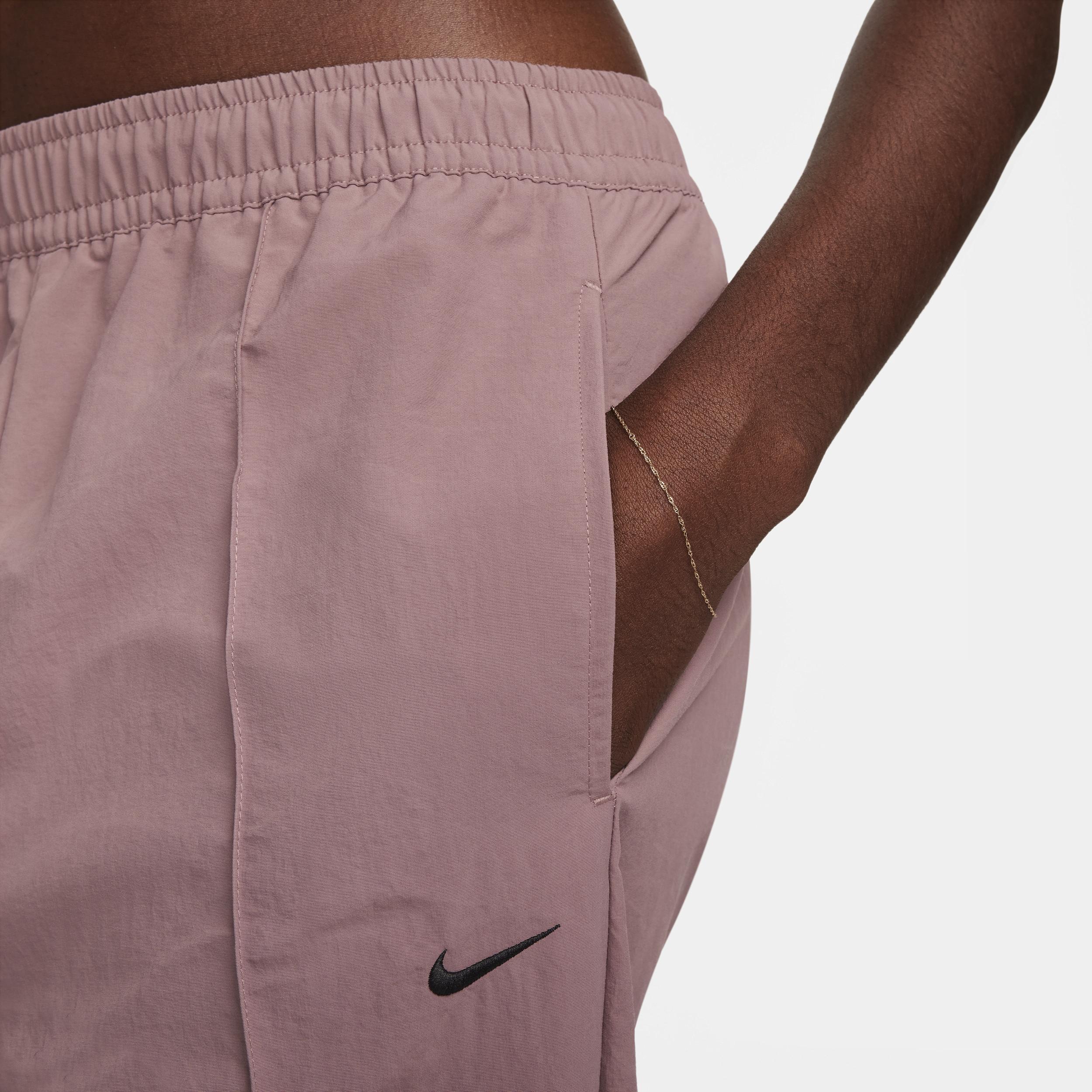 Nike Trend woven baggy parachute pants in smokey mauve Product Image