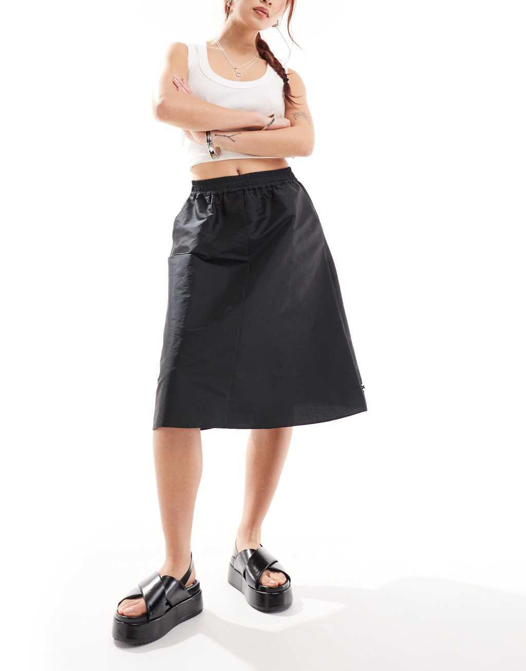 COLLUSION sporty boxer midi skirt in black product image