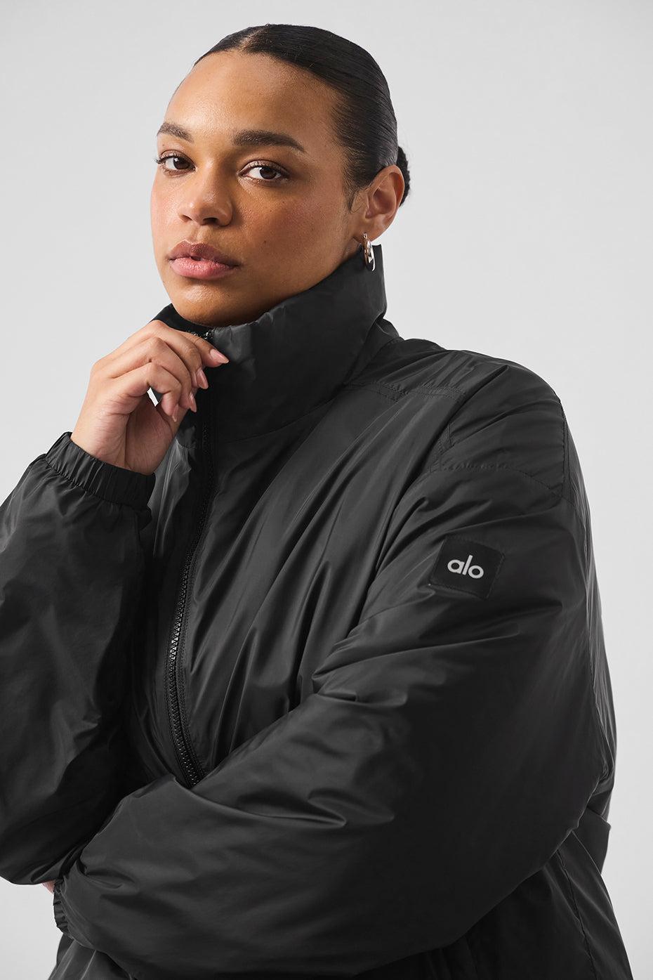 Latitude Light Weight 1/2 Zip Pullover Jacket - Black Female Product Image