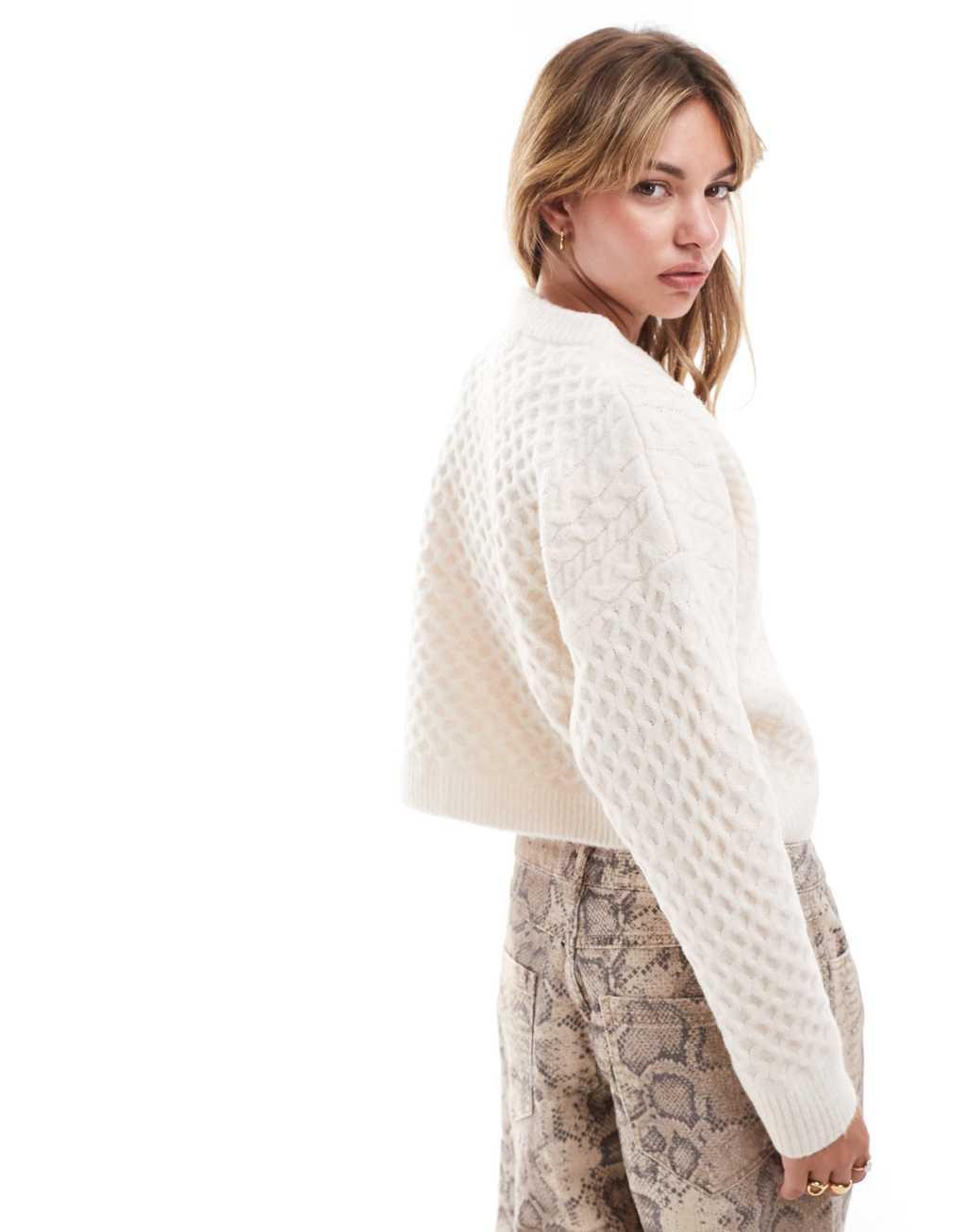 ASOS DESIGN crew neck cardigan in cable knit in cream Product Image