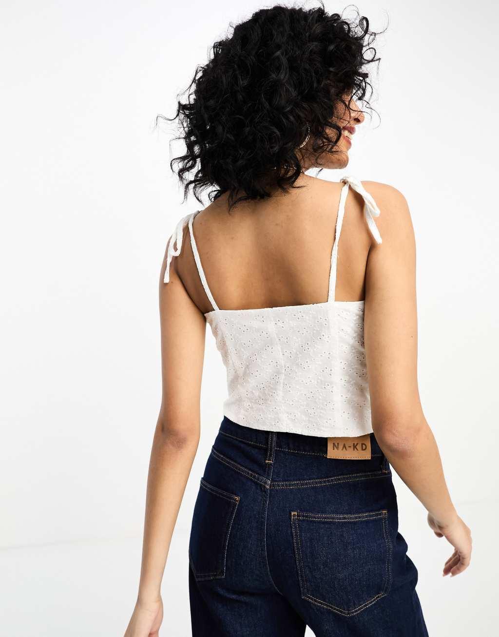 NA-KD x Chloe Schuterman eyelet corset top in white  Product Image