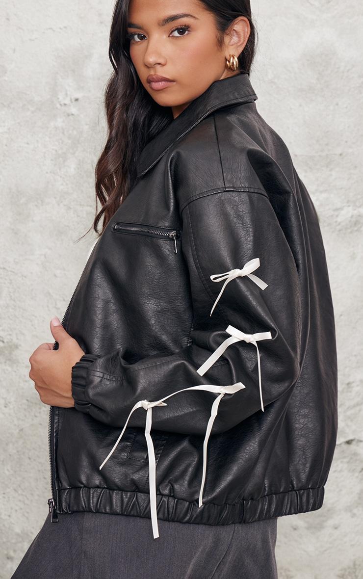 Black Faux Leather Bow Sleeve Detail Oversized Jacket Product Image