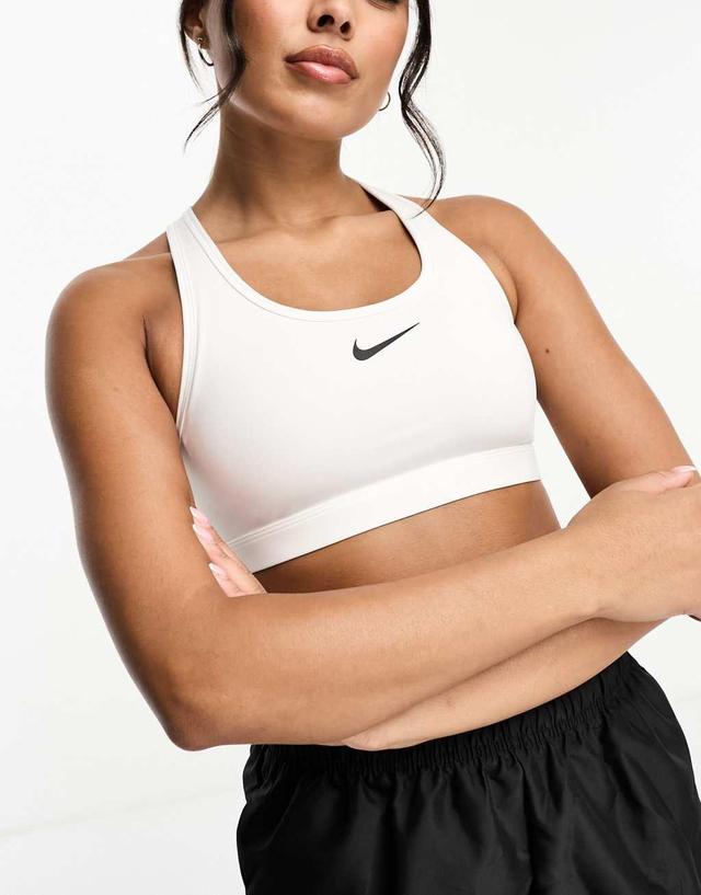 Nike Training swoosh medium support sports bra in white Product Image