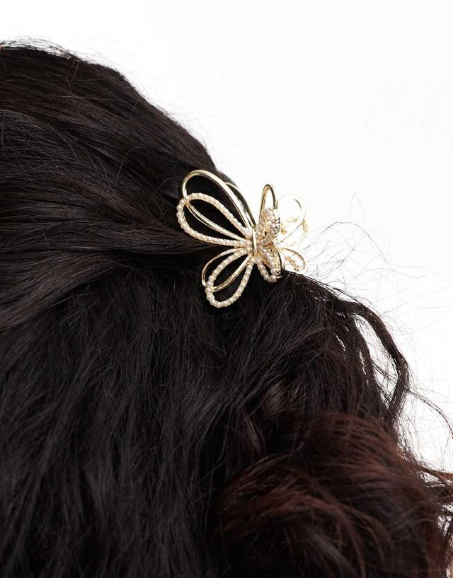 ASOS DESIGN hair claw with faux pearl butterfly design in gold tone Product Image