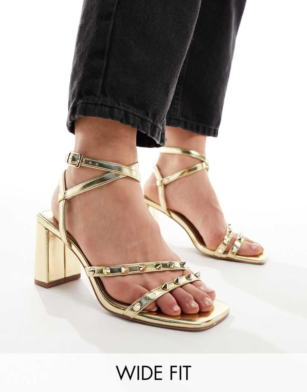 ASOS DESIGN Wide Fit Hampstead studded mid heeled sandals in gold Product Image