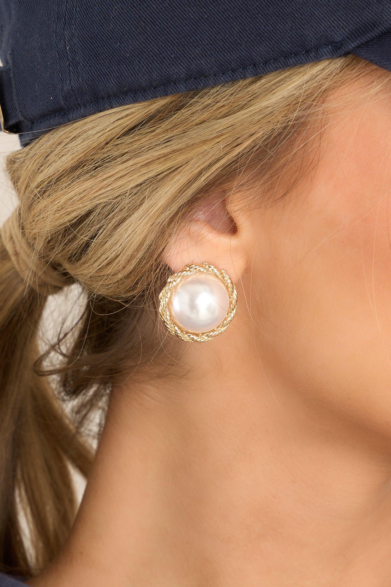 Peaceful Mind Gold and Pearl Stud Earrings Product Image