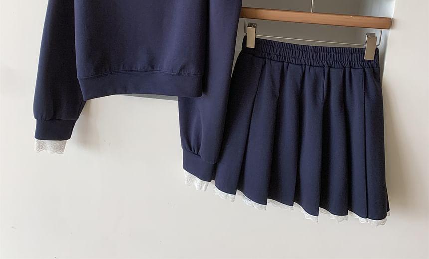 Set: Cold Shoulder Mock Two Piece Sweatshirt + Mid Rise Plain Mini Pleated Skirt Product Image