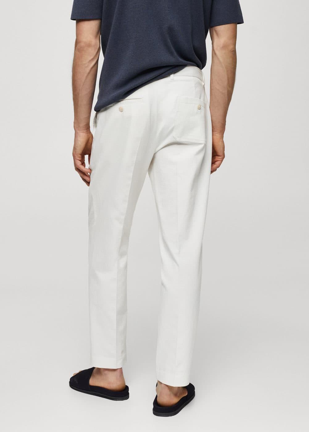 MANGO MAN - Slim fit trousers with pleated texture off whiteMen Product Image