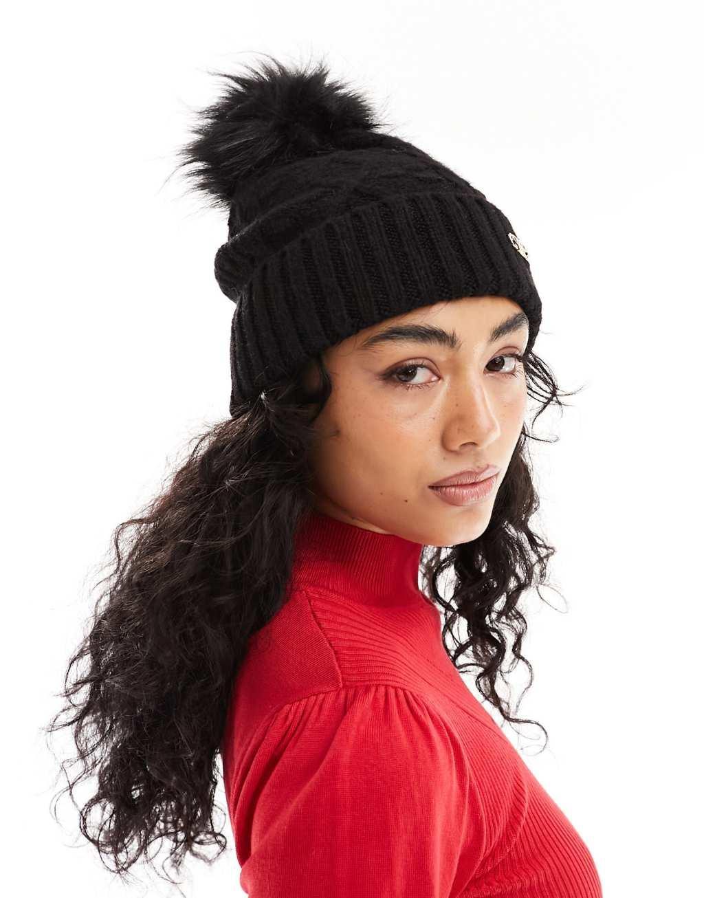 River Island cable knit pom beanie in black Product Image