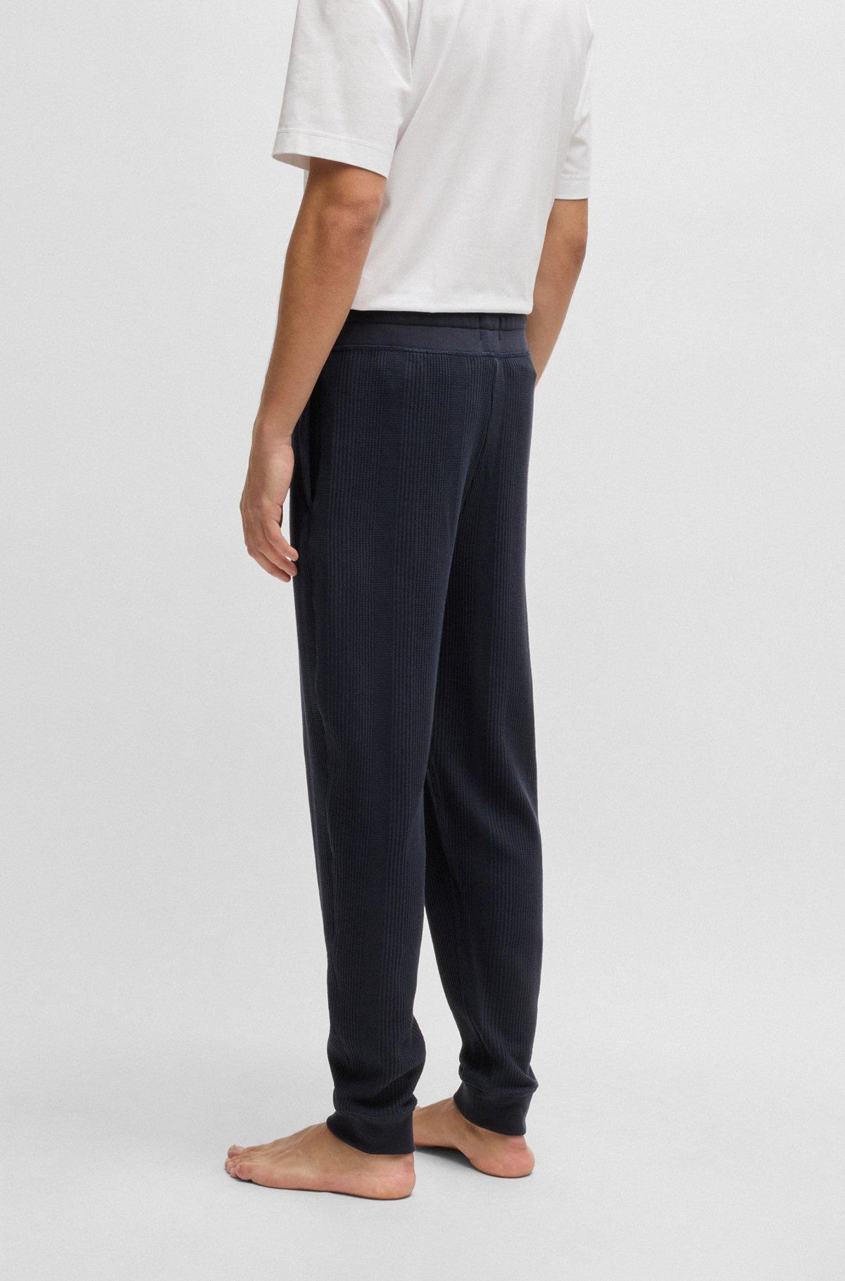 BOSS - Cotton tracksuit bottoms with embroidered logo - Dark Blue Product Image