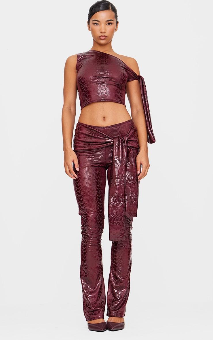 Burgundy Wet Look Croc Print Knot Detail Low Rise Skinny Flare Pants Product Image