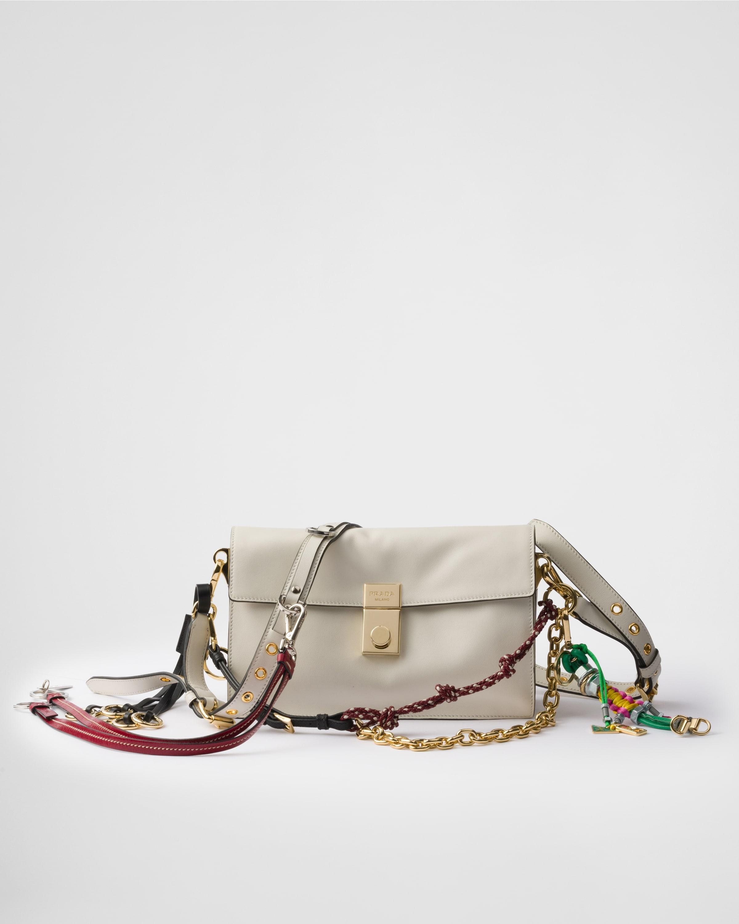 Prada Soft Sound small leather shoulder bag with charms Product Image