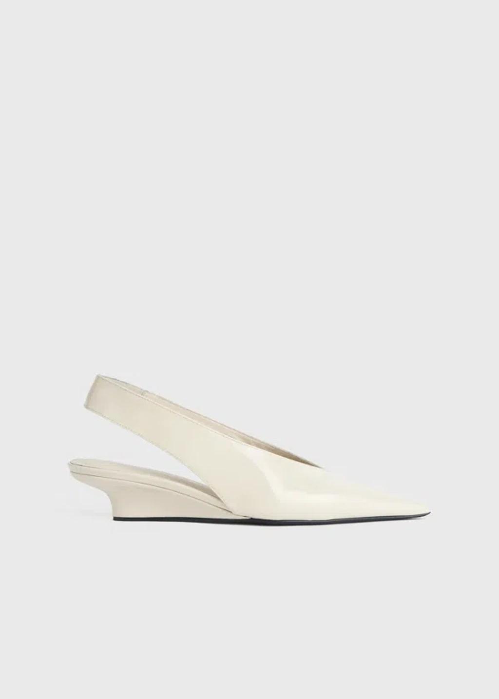 The Wedge-heel Leather Slingback Pumps In Cream product image