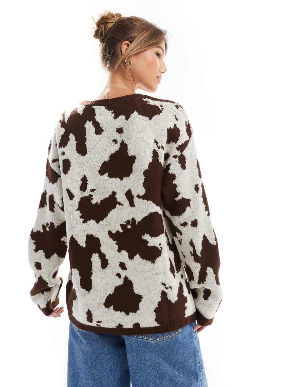 ASOS DESIGN fluffy knitted sweater in cow print Product Image