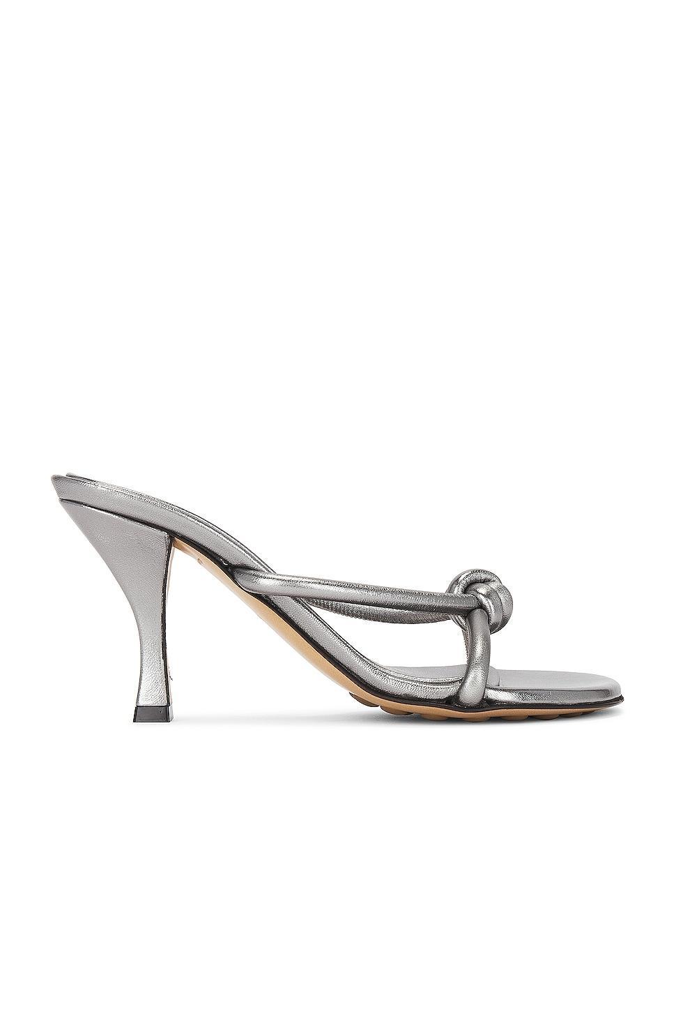 Bottega Veneta Metallic Blink Mule Sandal in Silver - Metallic Silver. Size 36 (also in 36.5, 37, 37.5). Product Image