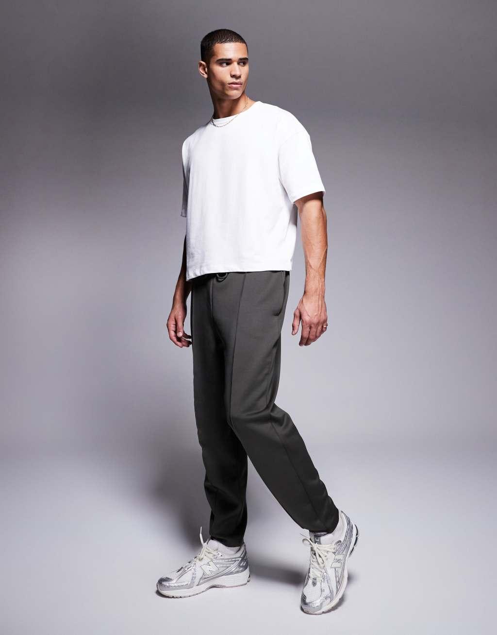 ASOS DESIGN tapered scuba sweatpants in khaki Product Image