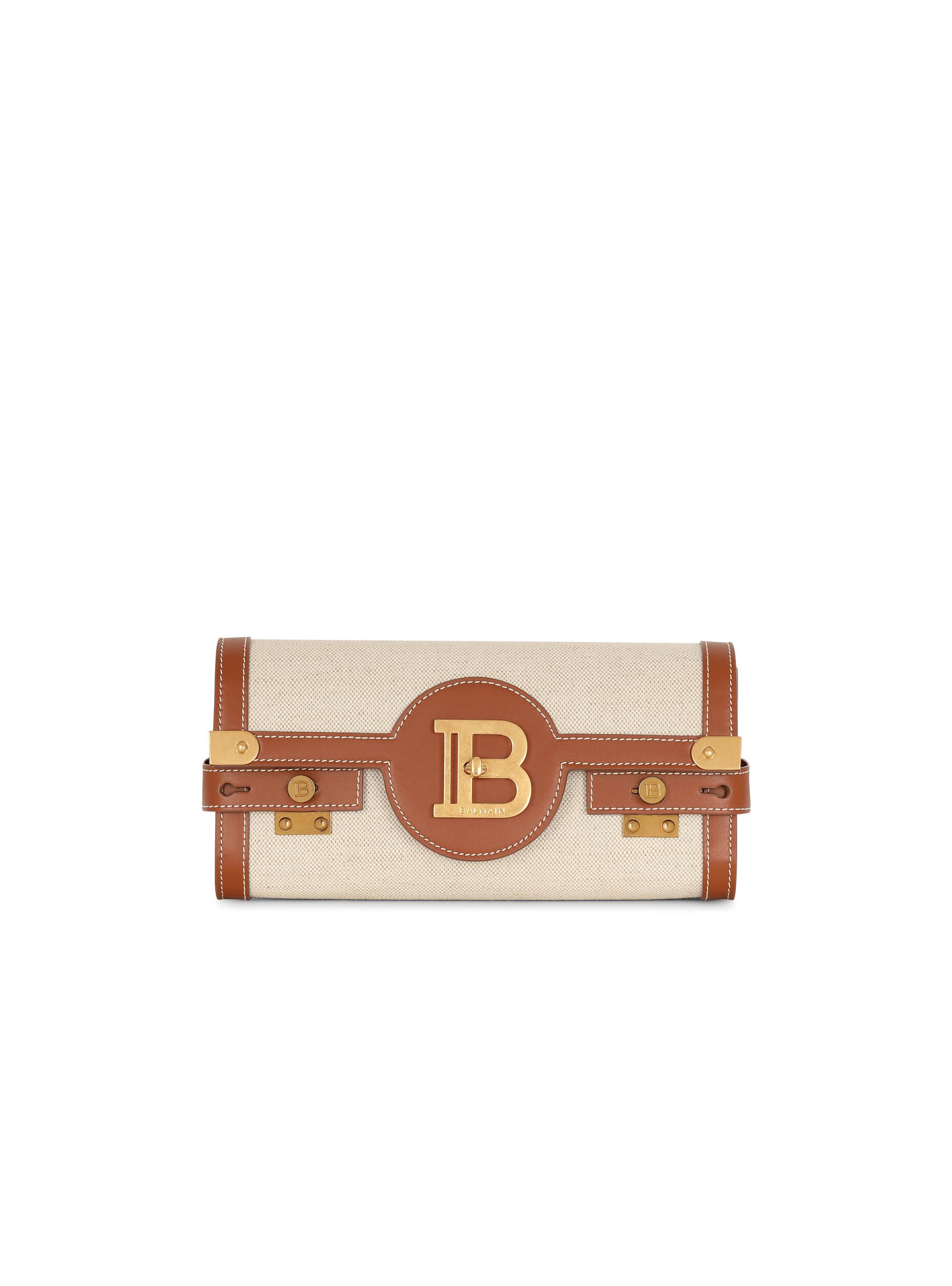 B-Buzz 23 leather and canvas clutch bag Product Image