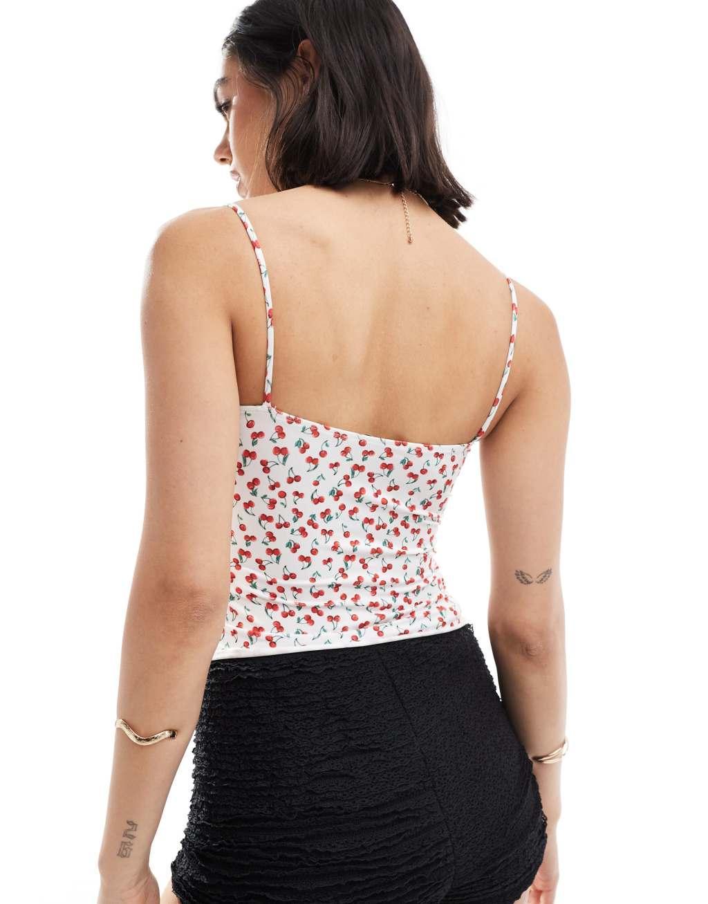 Bershka strappy straight neck cami top in cherry print Product Image