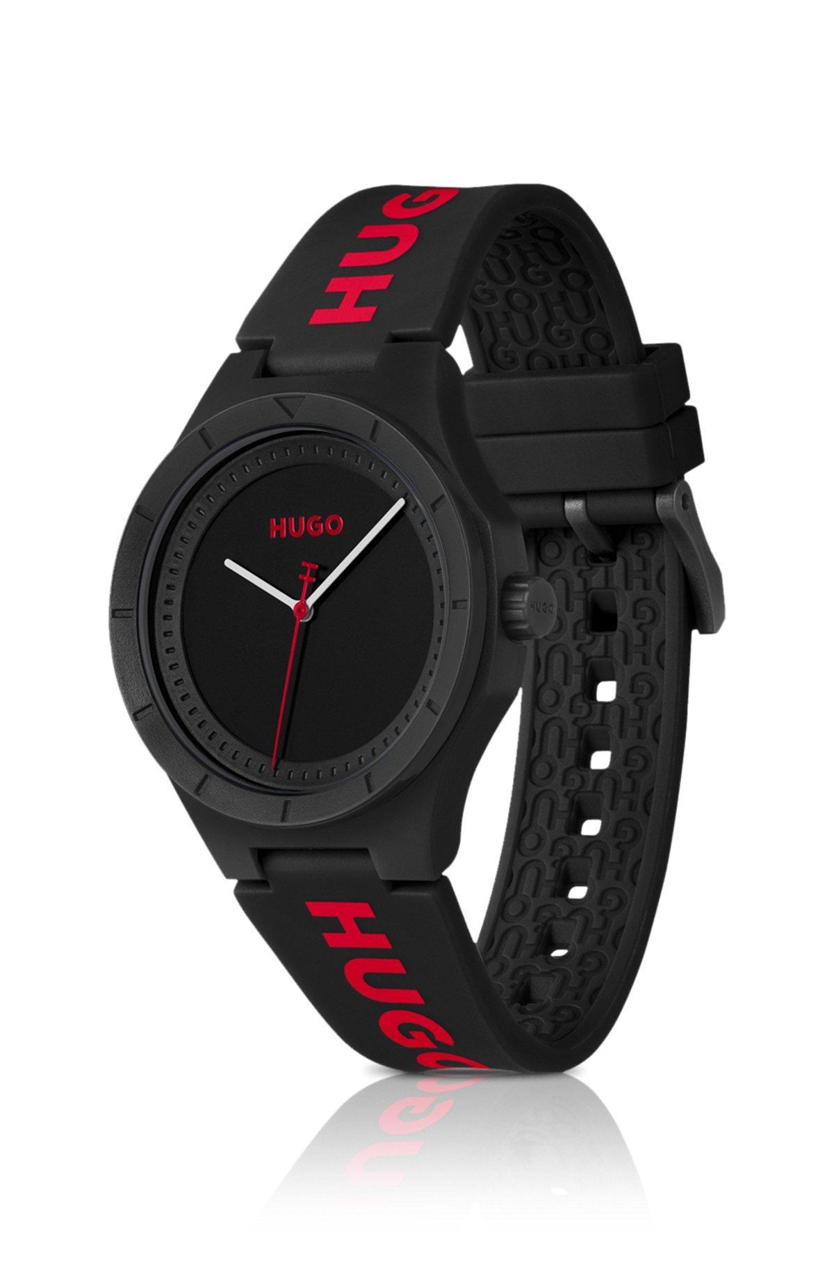 Matte-black watch with branded silicone strap Product Image