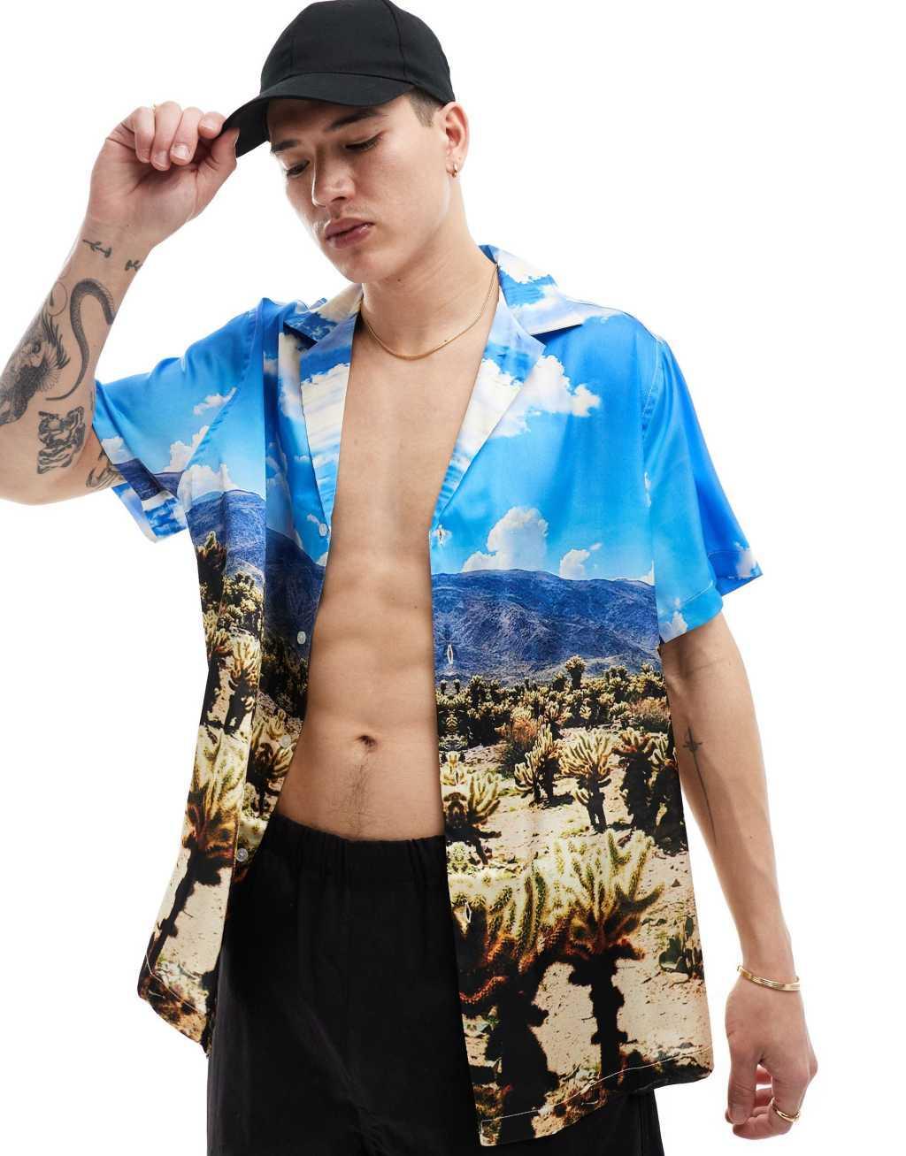 ASOS DESIGN relaxed deep revere satin shirt with scenic desert print Product Image