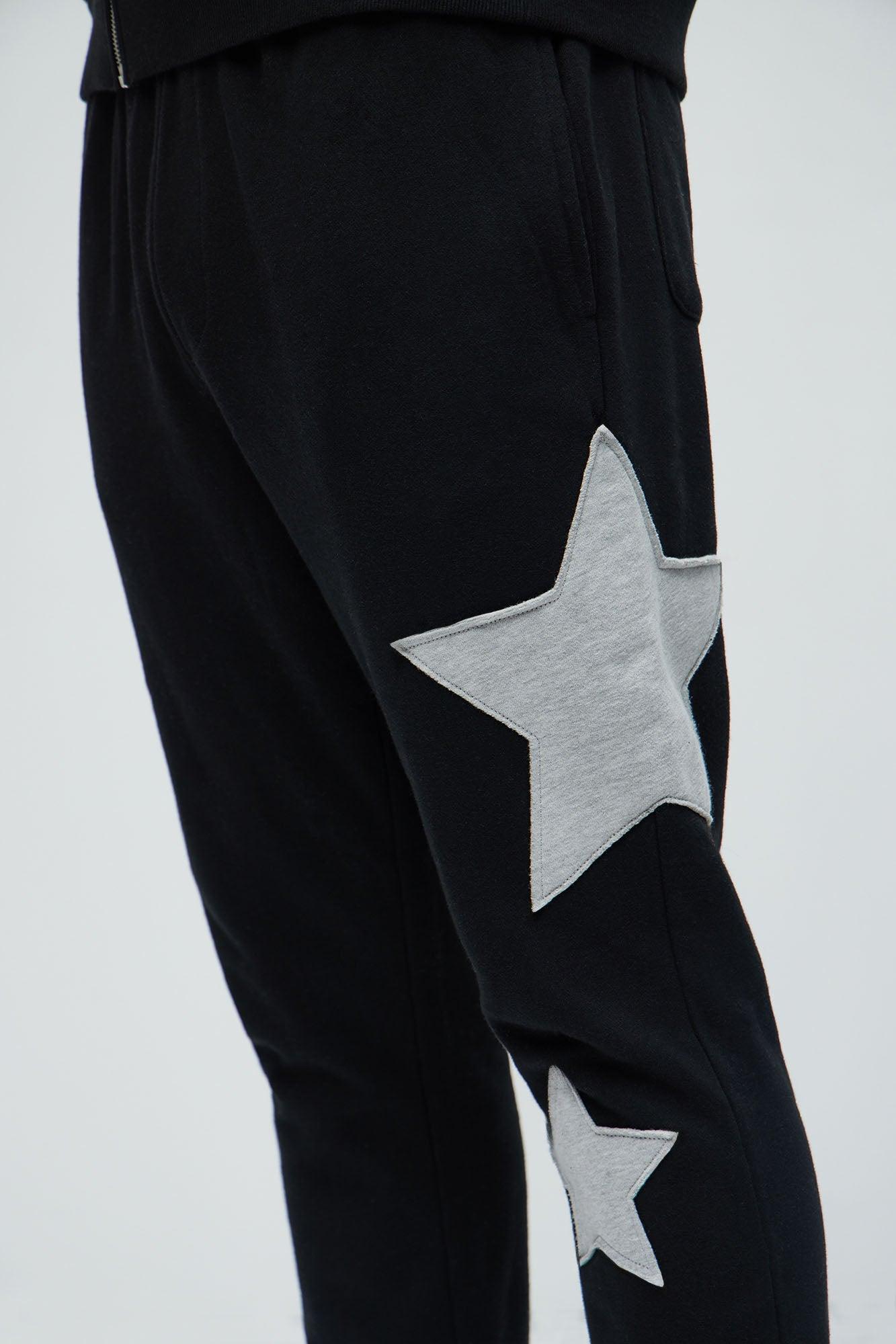 Tyson Stars Skinny Flared Sweatpants - Black Product Image