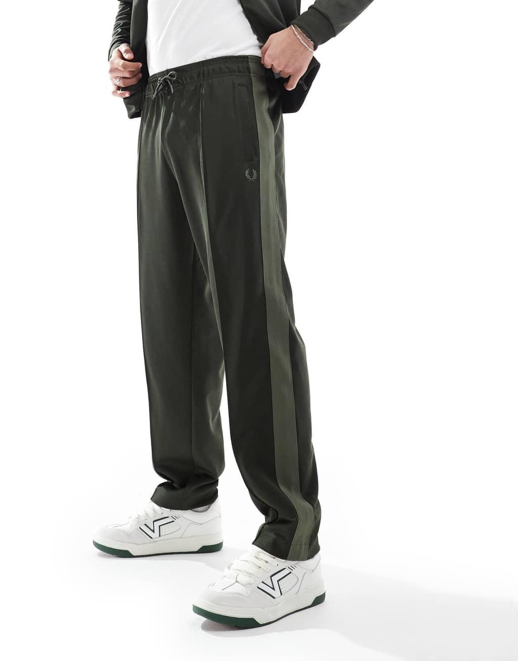 Fred Perry track sweatpants in dark green with taping - part of a set Product Image