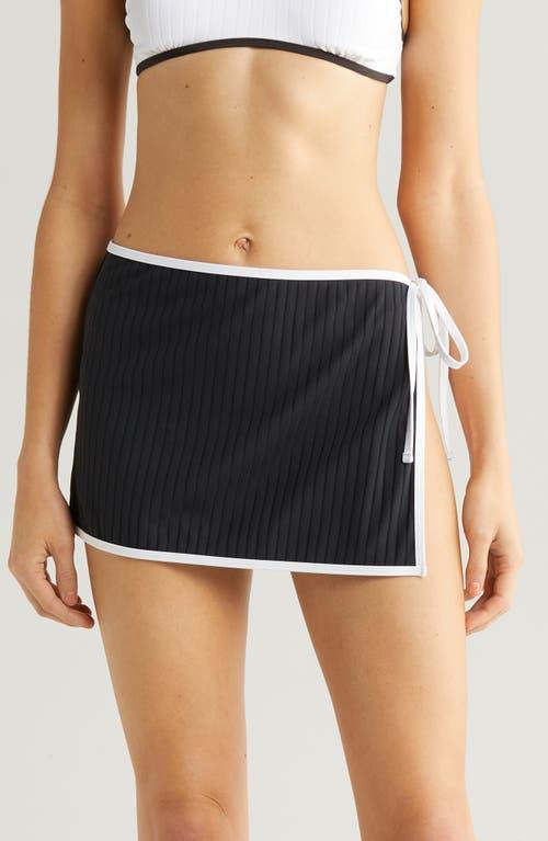 Solid & Striped Swim Skirt in Black. Product Image