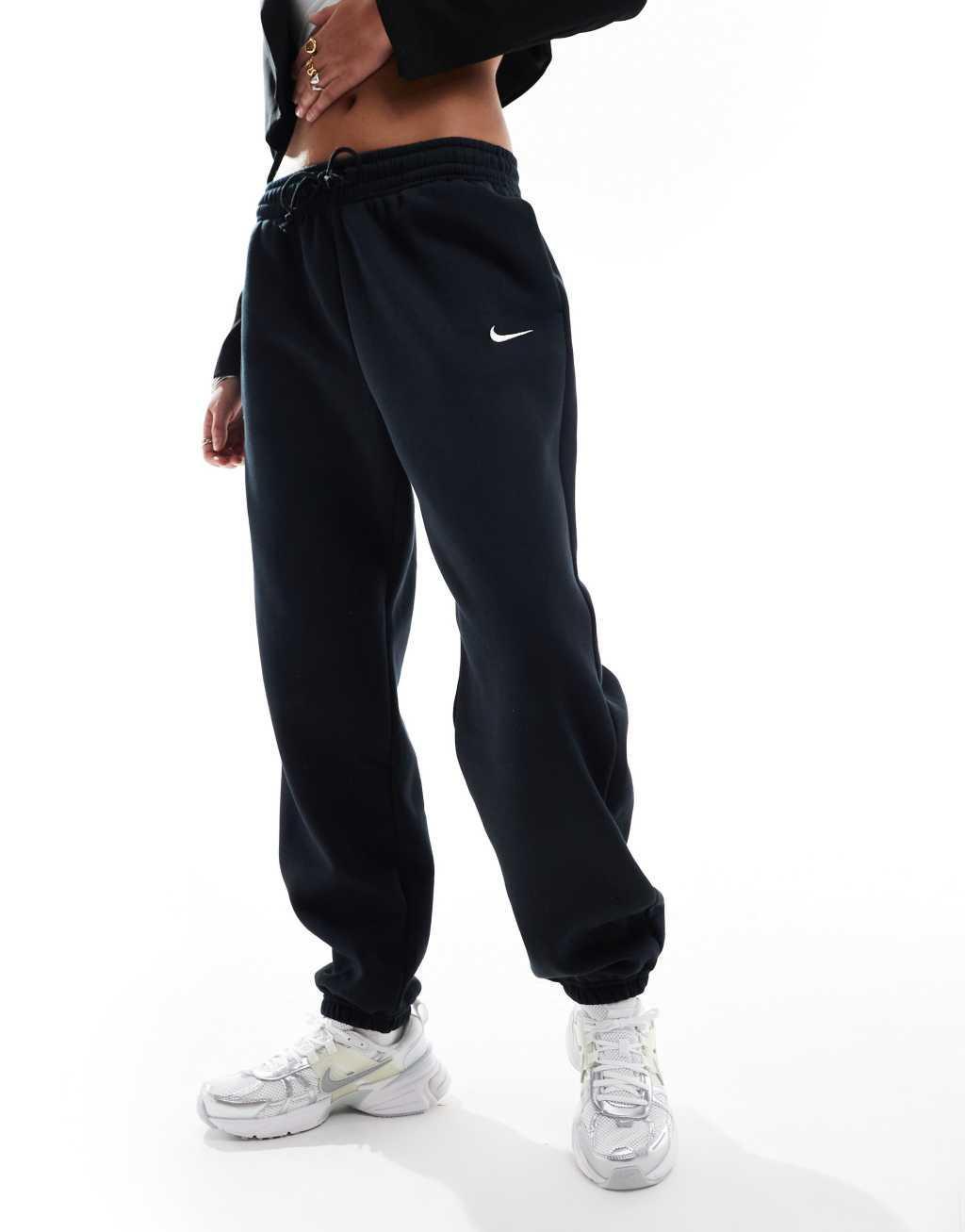 Nike Mini Swoosh sweatpants in black  Product Image