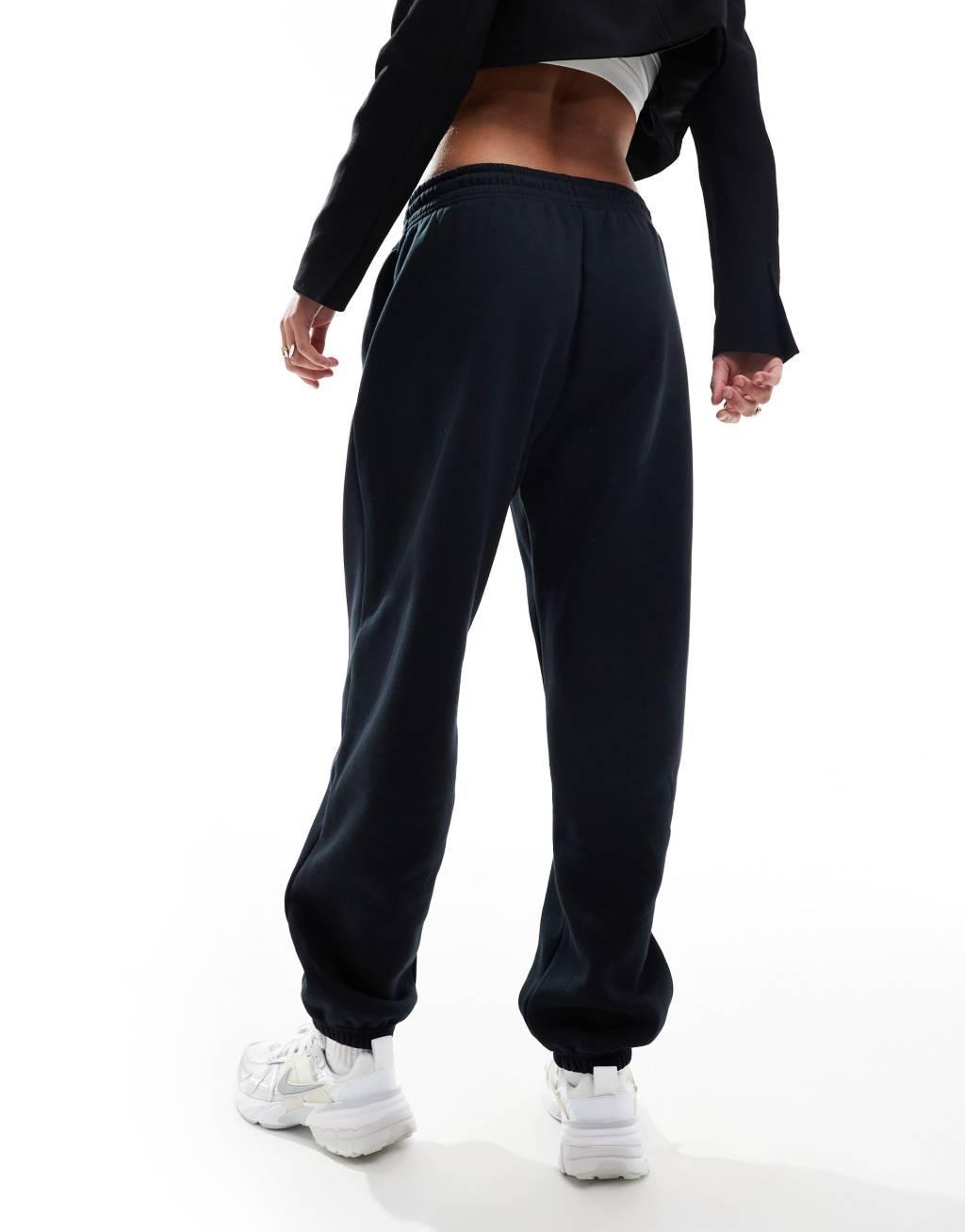 Nike Mini Swoosh sweatpants in black  Product Image