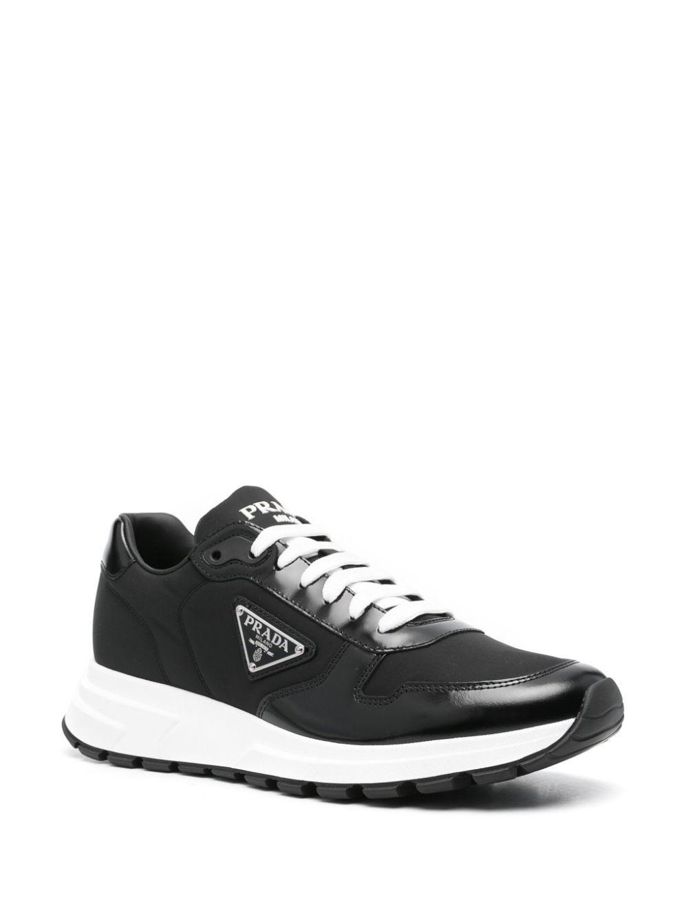 PRADA Logo-plaque Low-top Sneakers In Black Product Image