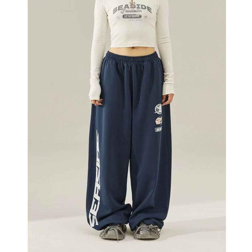 Low Waist Lettering Print Loose-Fit Wide-Leg Sweatpants Product Image