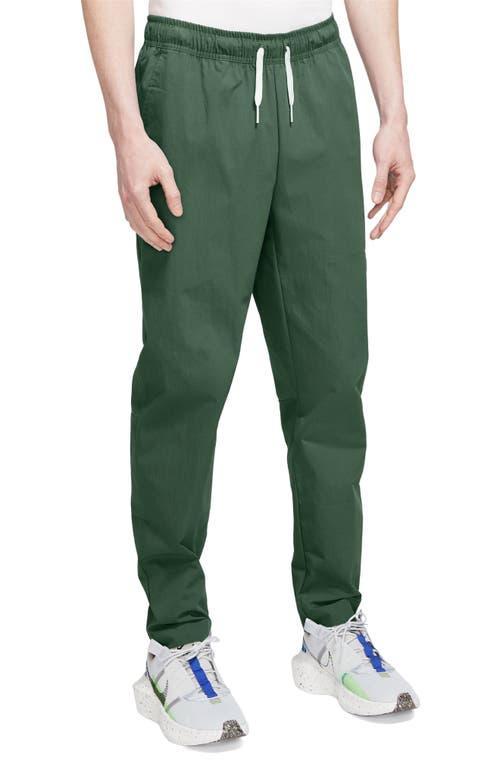 NIKE Woven Tapered Leg Pants In Fir/white Product Image